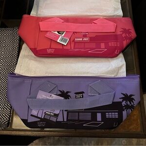 Two Trader Joe’s bags, pink and lavender